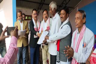 Land holding Certificate distribution in presence of Minister Jogen Mohan etv bharat news