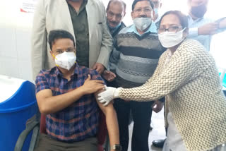Several officials, including DC vaccinated in dhanbad