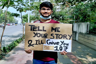 A boy attracts the attention of Puneites