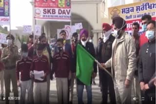 A pedestrian march to raise awareness about traffic rules