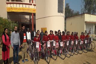 distribution of bicycles among school girls under mission shakti in noida uttar pradesh