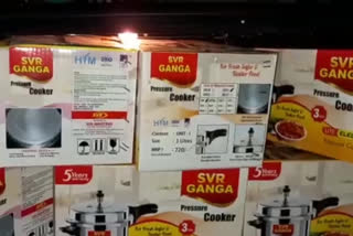 rice cookers distribute to voters in bhimavaram