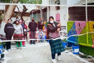 The corporator played badminton in the backline where dirt used to live