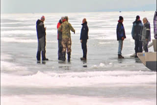 66 people rescued from ice floes adrift on Wisconsin bay