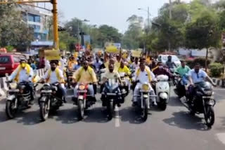 tdp mla velagapudi ramakrishna conduct bike rally against vishaka steel plant privatization