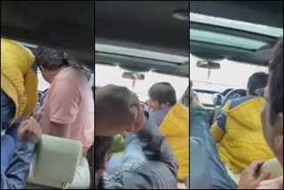 Boys making stunts inside of car in vijayapura