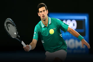 australian open novak djokovic advances to 2nd round