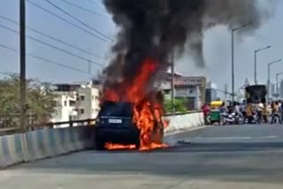 Car Burnt on the road in Bengaluru