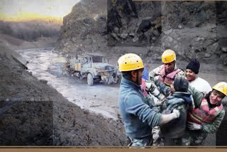 Labourers being washed away by water