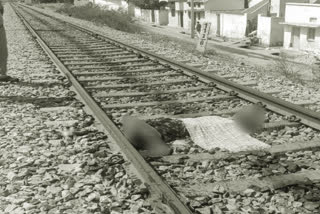 Unidentified woman commits suicide by falling under train in mahabubnagar district