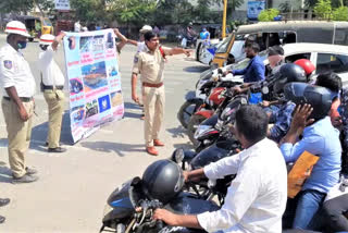 Police conducted awareness drive for motorists in Nirmal district center