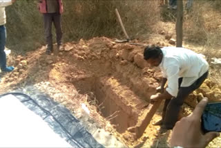 dead body taken out of grave in banda