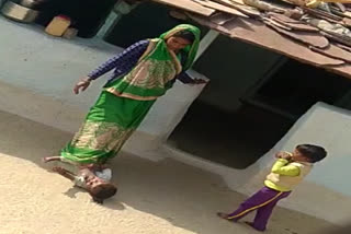 a-mother-beating-her-children-in-sagar-district