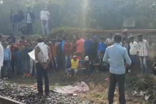 dead body of businessman found from railway side in dhanbad