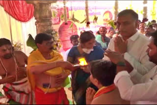 Minister Harish Rao in the presence of Pullurubanda Lakshminarsinh Swamy