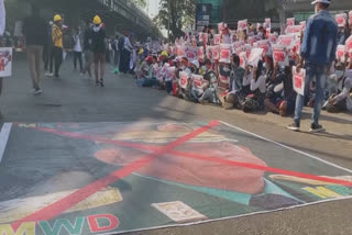 Protest against coup outside Yangon mall