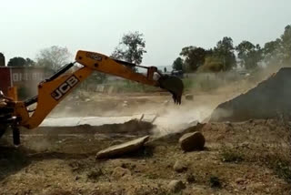 Bulldozer on illegal construction