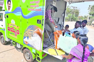 Beneficiaries taking rice