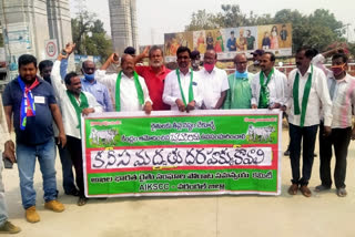 farmers union leaders protest in front of warangal railway station