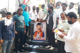 milk anointing of sanjay rathod photo in aurangabad