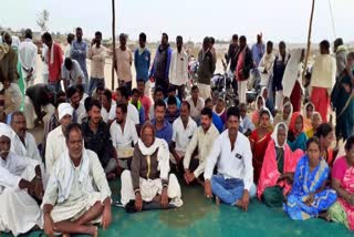 ponkal villagers protest for compensation at nirmal district