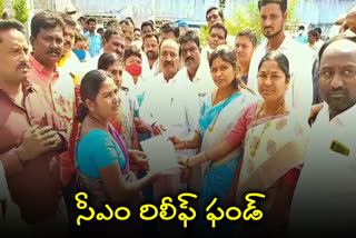 telangana health minister etela rajender has given cm relief fund cheque to road accident victims
