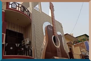 rahul arora of haridwar made his house a guitar house