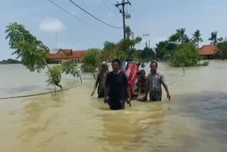 indonesia village flooded after river bursts banks