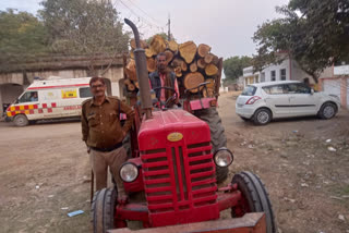 Two tractor filled with illegal wood seized