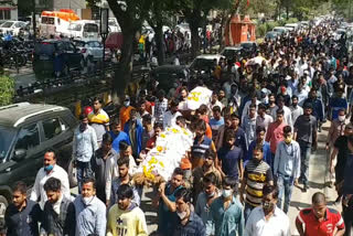 Funeral procession of three friends together