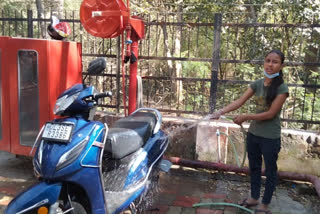 staff misusing water to wash their vehicles at SDM office