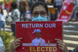 Pro-military marchers in Myanmar attack anti-coup protesters