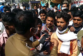 Police officers explain to family