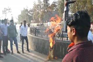 burns effigy of CM against inflation