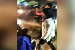 Woman beating young men for molesting