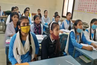 Students sitting in school