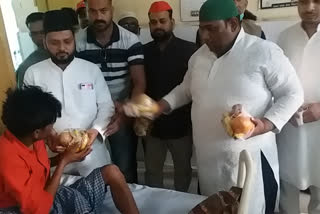 political parties distributed fruits in patients on hazrat ali day barabanki