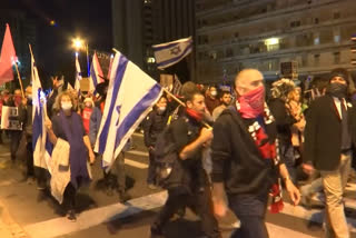 thousands join anti netanyahu protest in israel, demanding his resignation
