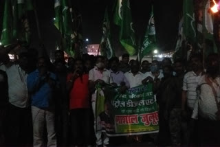 jharkhand  mukti  morcha  took  out a torch procession against inflation in ranchi
