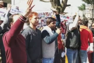Awantipora: Power department employees protest
