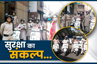 Women policemen riding on scooty in Delhi to help people