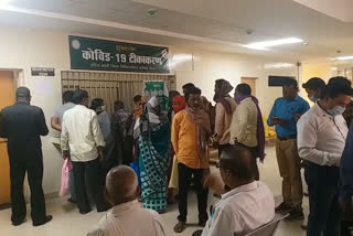 Crowd of people in district hospital