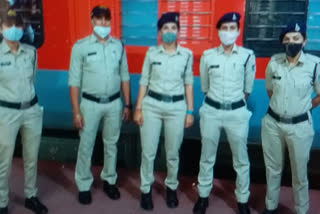 Female policeman checking in train