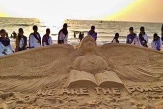 sand art at Malpe Beach on the occation womens day