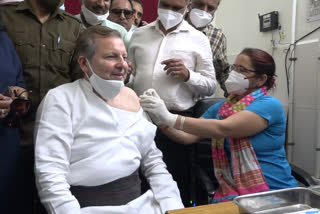 Rohtak MP Dr. Arvind Sharma along with family taken Corona vaccine