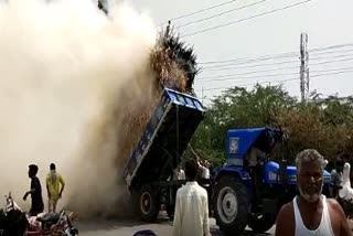 Fire to Grass loaded Tractor