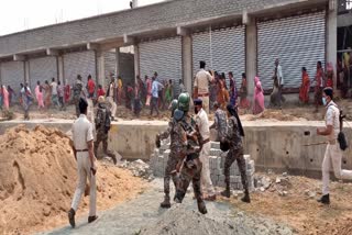 police-lathi-charged-in-dhanbad