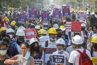 Myanmar police raid housing for striking railway workers