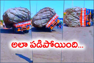 over loaded lorry flipped at allapur tollgate live video