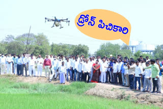 Pesticide spray with drone for crops at huzurabad